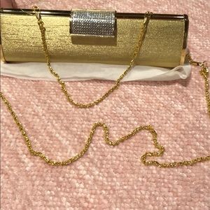 Gold one of a kind clutch never worn before